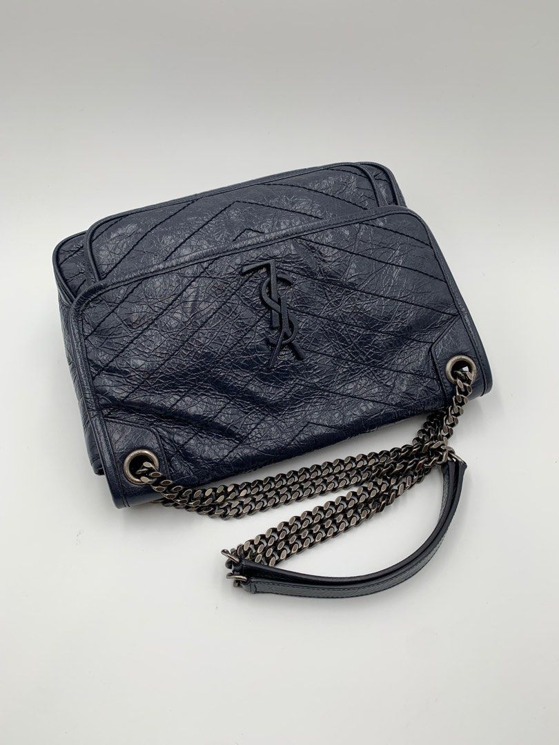 Niki chain wallet in crinkled vintage leather store