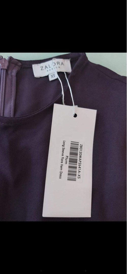 Zalora Dress (Category: Dresses) located in Pasig City. Submitted by panavi (Listing ID 1252057604, Image 3). Description: Zalora Dress BNWT Bought it for P939 Selling it for only P450 XS on Tag, fits XS to Small XS Size Chart: UK 6, US 2, EU 34, Chest 31 in, Waist 25 in, Hips 36 in Sleeves fr Neck: 28 1/2 inches Length: 34 inches Color: Plum.