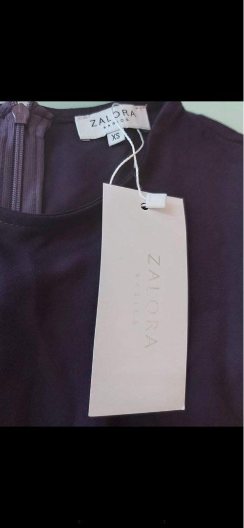 Zalora Dress (Category: Dresses) located in Pasig City. Submitted by panavi (Listing ID 1252057604, Image 2). Description: Zalora Dress BNWT Bought it for P939 Selling it for only P450 XS on Tag, fits XS to Small XS Size Chart: UK 6, US 2, EU 34, Chest 31 in, Waist 25 in, Hips 36 in Sleeves fr Neck: 28 1/2 inches Length: 34 inches Color: Plum.