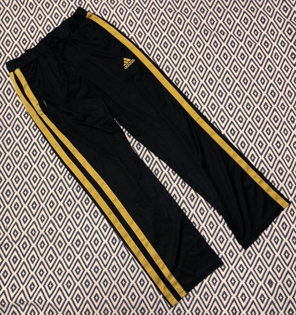 Gold stripe adidas pants new arrivals