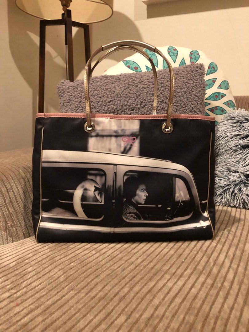 Anya Hindmarch Photobag Featuring The Swan Riding in Car New Gen