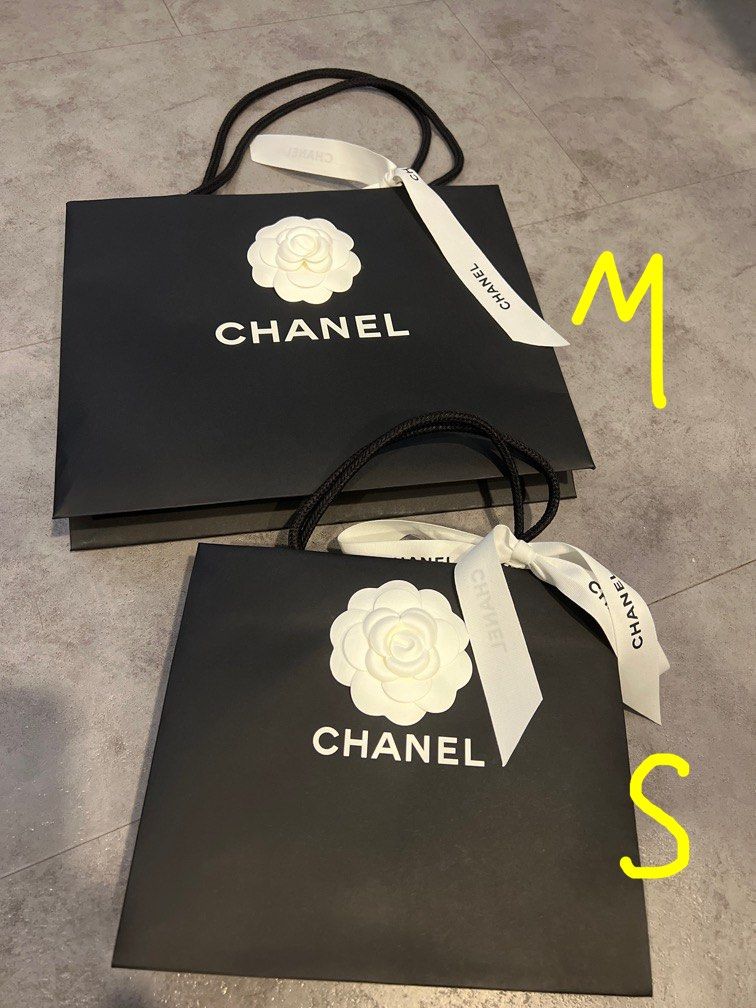 authentic chanel white paper bag with one of the