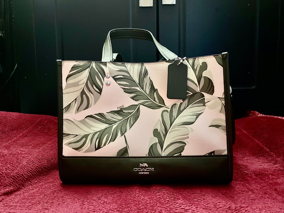 Coach dempsey carryall with banana leaves print on sale