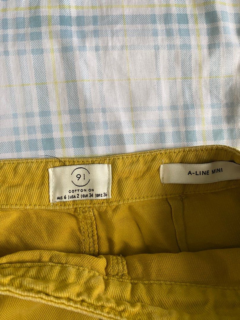 Cotton on Mustard A Line Skirt (Category: Skirts) located in Pasig City. Submitted by madebyclaive (Listing ID 1247024649, Image 2). Description: Cotton on A line skirt color: mustard yellow size: 22-24.