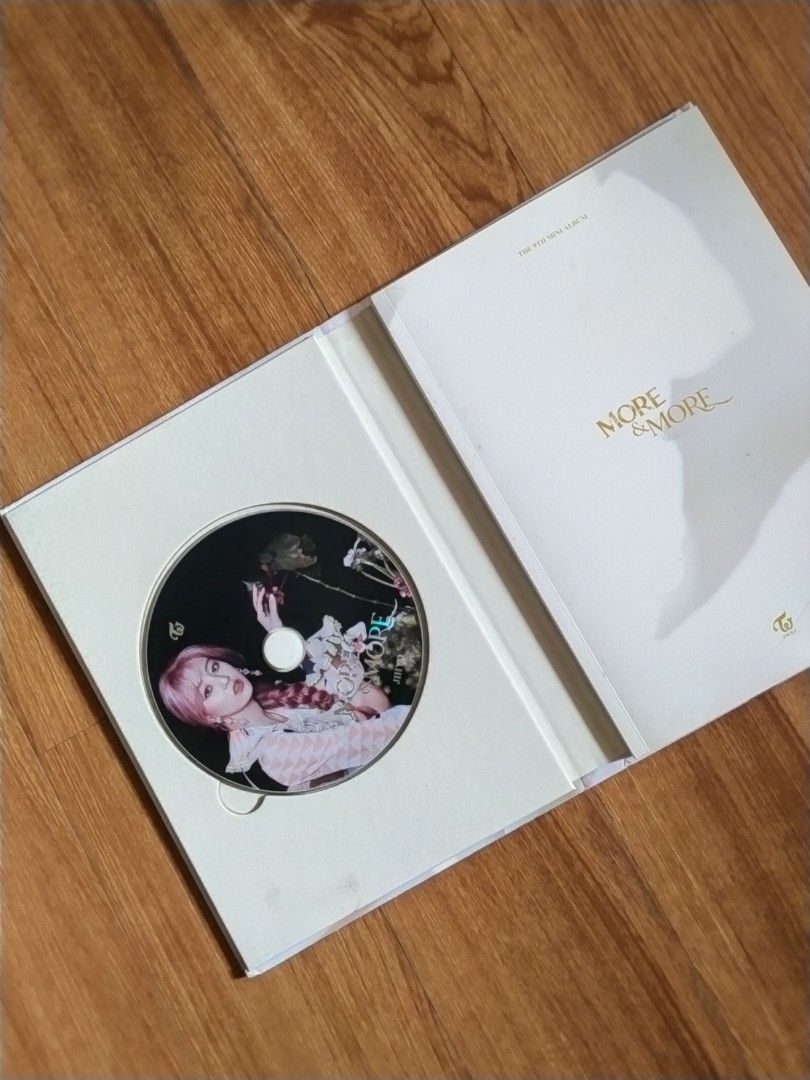 TWICE MORE & MORE UNSEALED ALBUM (Category: CDs & DVDs) located in Bulacan. Submitted by gbrlrxs (Listing ID 1246988641, Image 2). Description: - cd & photobook only - rfs: decluttering MOP: GCASH only MOD: J&T.
