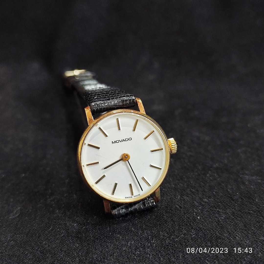 Movado White dial Gold watch Women s Fashion Watches