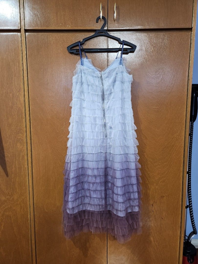 Ombre Ruffle Tulle Dress (Category: Dresses) located in Marikina City. Submitted by MSS_32 (Listing ID 1247069777, Image 2). Description: * Cotre Brand Size S on tag * Purple ombre color * zipper closure at the back * shoulder straps non adjustable * Bust up to 32" * Waist up to 30" * Hips up to 38" * Length 42" * MOP Gcash/BPI *SF c/o buyer.