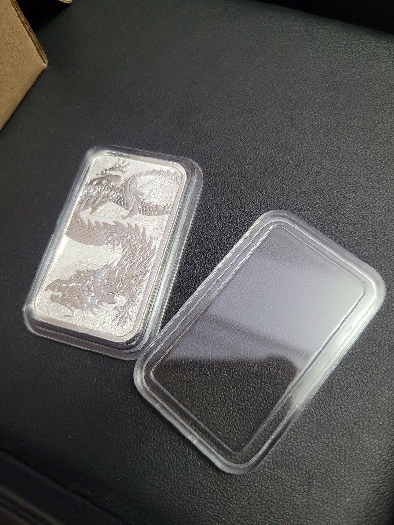 Perth Mint 1oz Silver Dragon Coin Bar 2023 (Category: Currency) located in Singapore. Submitted by mini_mini_miao_93 (Listing ID 1247096555, Image 2). Description: Less than 10 pieces on hand. $55 with normal pouch. $60 with direct fit capsule, capsule from EU..