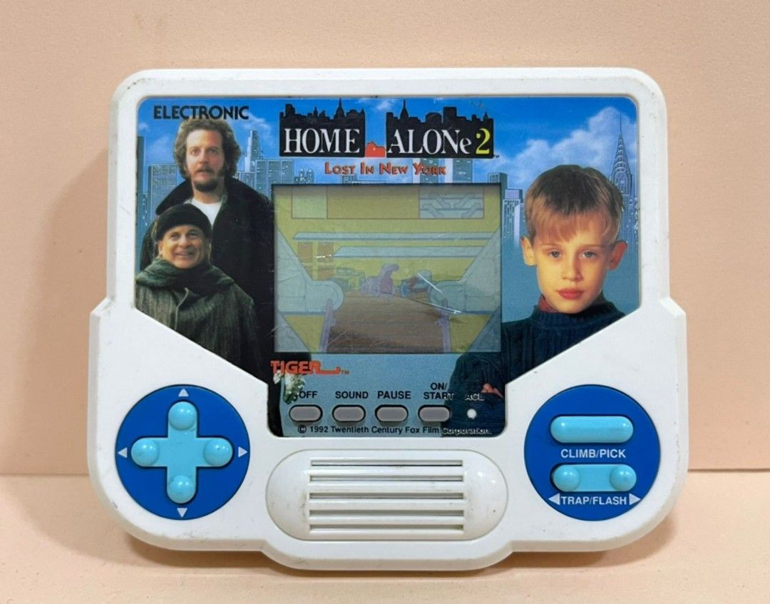 Vintage 1992 Home Alone 2 LCD Handheld Games by Tiger Electronics