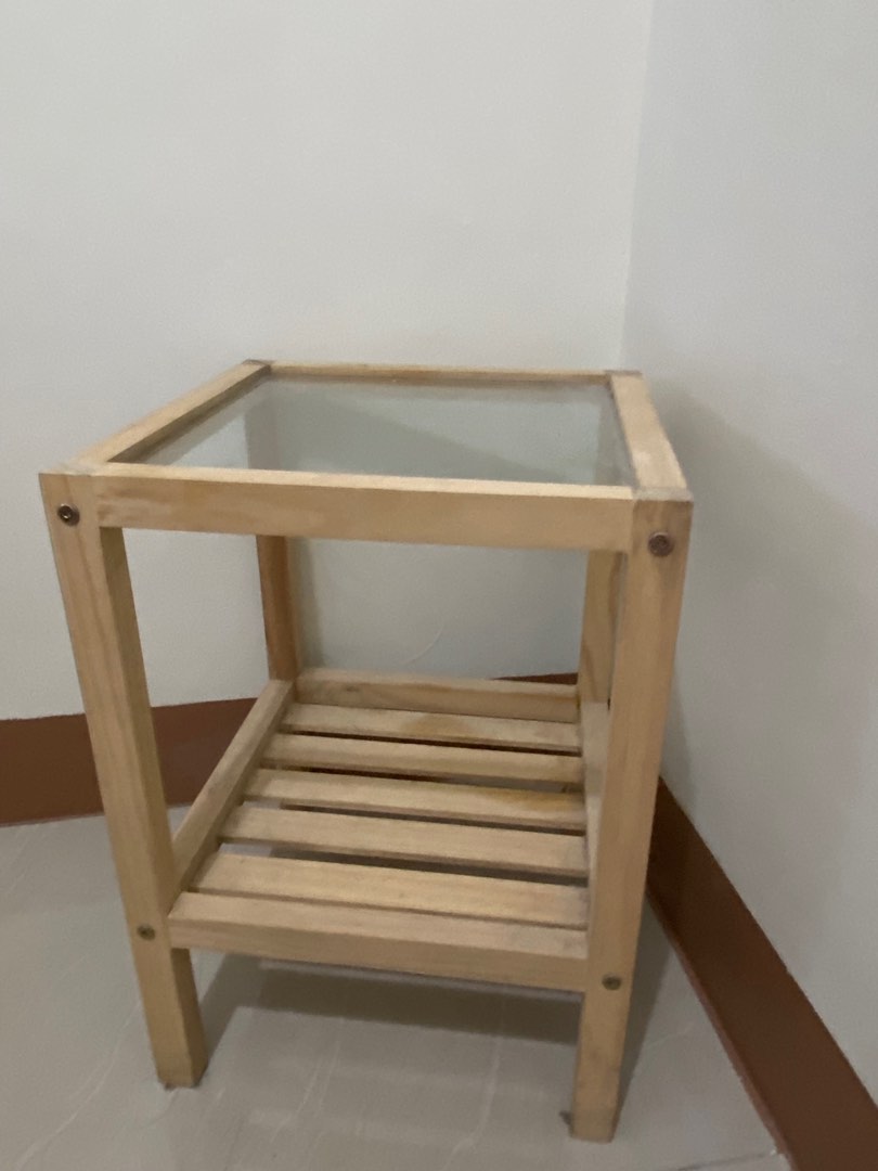 Wooden bedside table (glass top) on Carousell