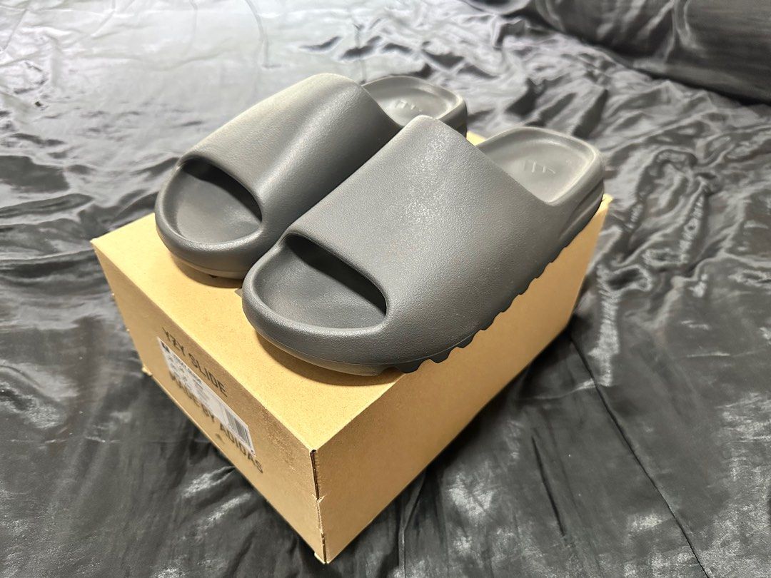 Yeezy Slide Onyx UK10, Men's Fashion, Footwear, Flipflops and Slides on  Carousell