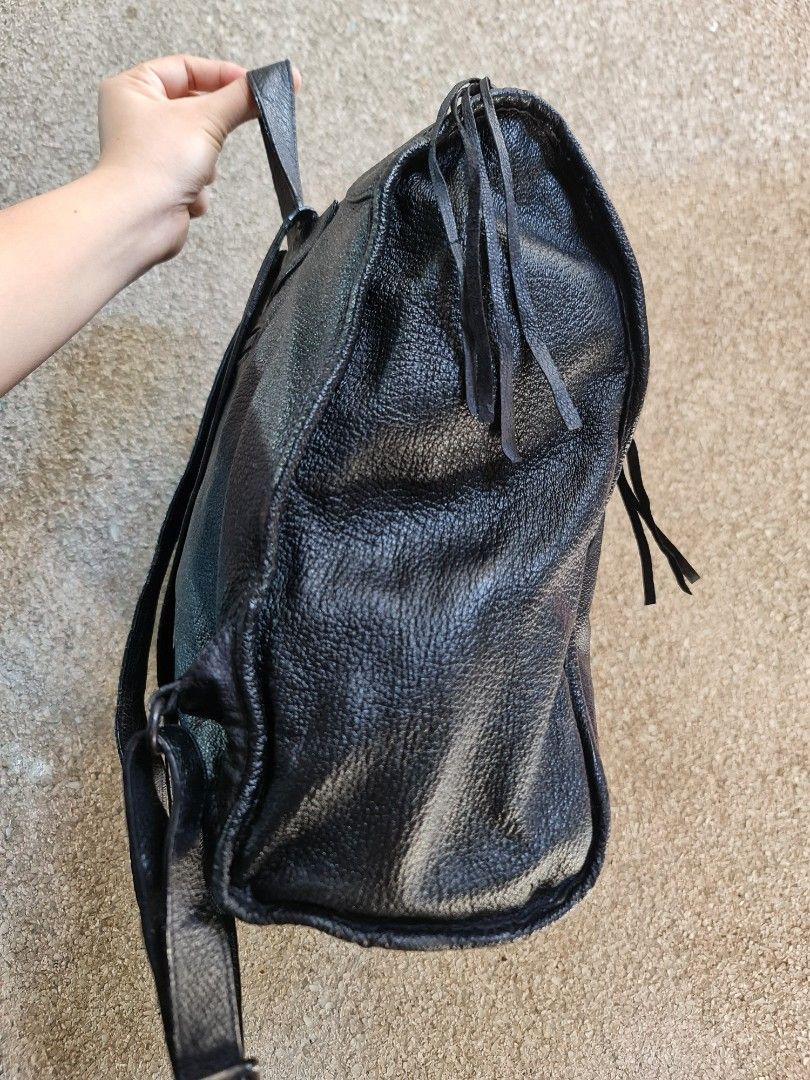 Balenciaga Backpack + Beltbag (Category: Luxury Bags & Wallets) located in Butuan. Submitted by yangzzzverzosa (Listing ID 1247179138, Image 2). Description: crackings rubber lining still manageable height: 12.5 " length: 12" width 5.5" large size free balen beltbag.