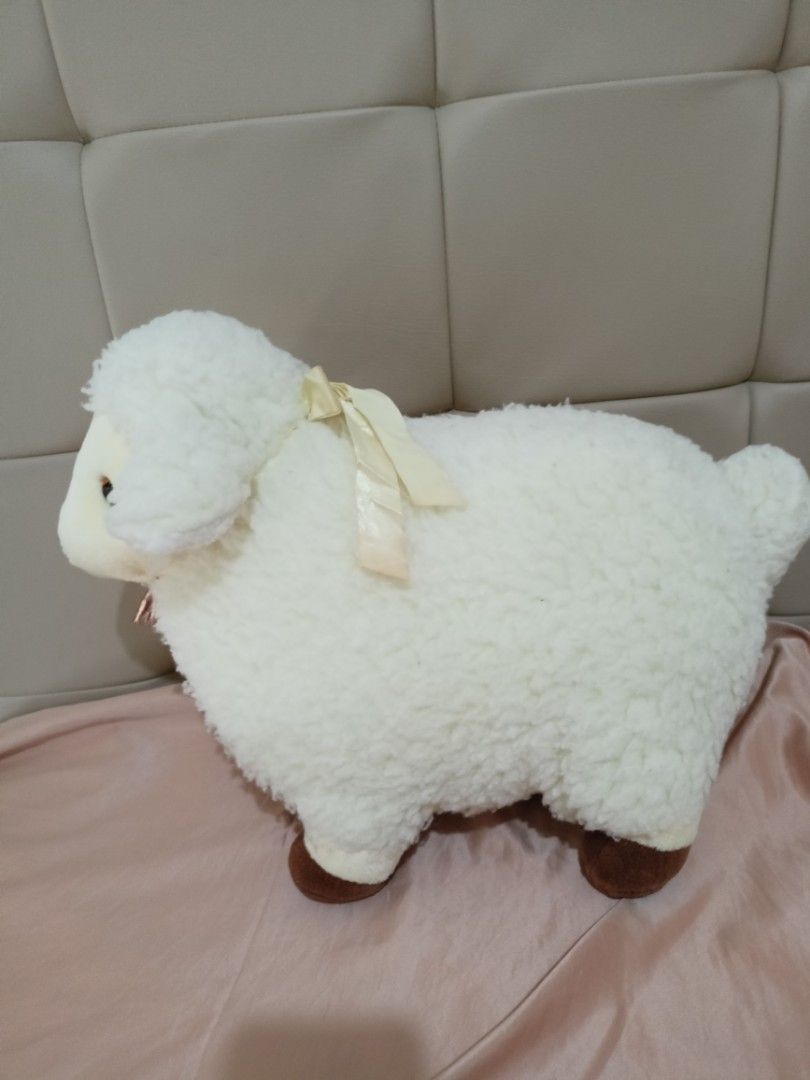 Big Sheep Stuff Toy (Category: Plushies & Soft Toys) located in Lipa City. Submitted by luckymoneyharvest999 (Listing ID 1247187324, Image 2). Description: The body is like new however you will see a tarnish on the bell and nose. 18.5 x11 inches(side measurement nose to tail) 14x 8 inches (front head to toe,side to side).