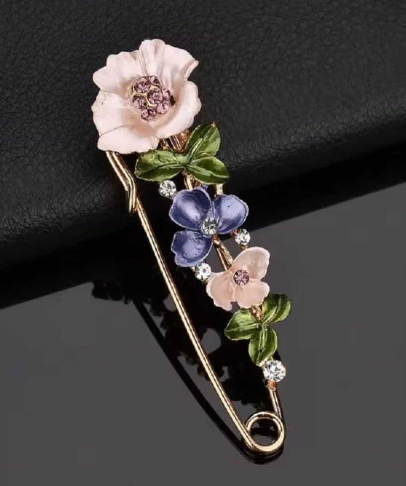 Gemstone brooch on sale