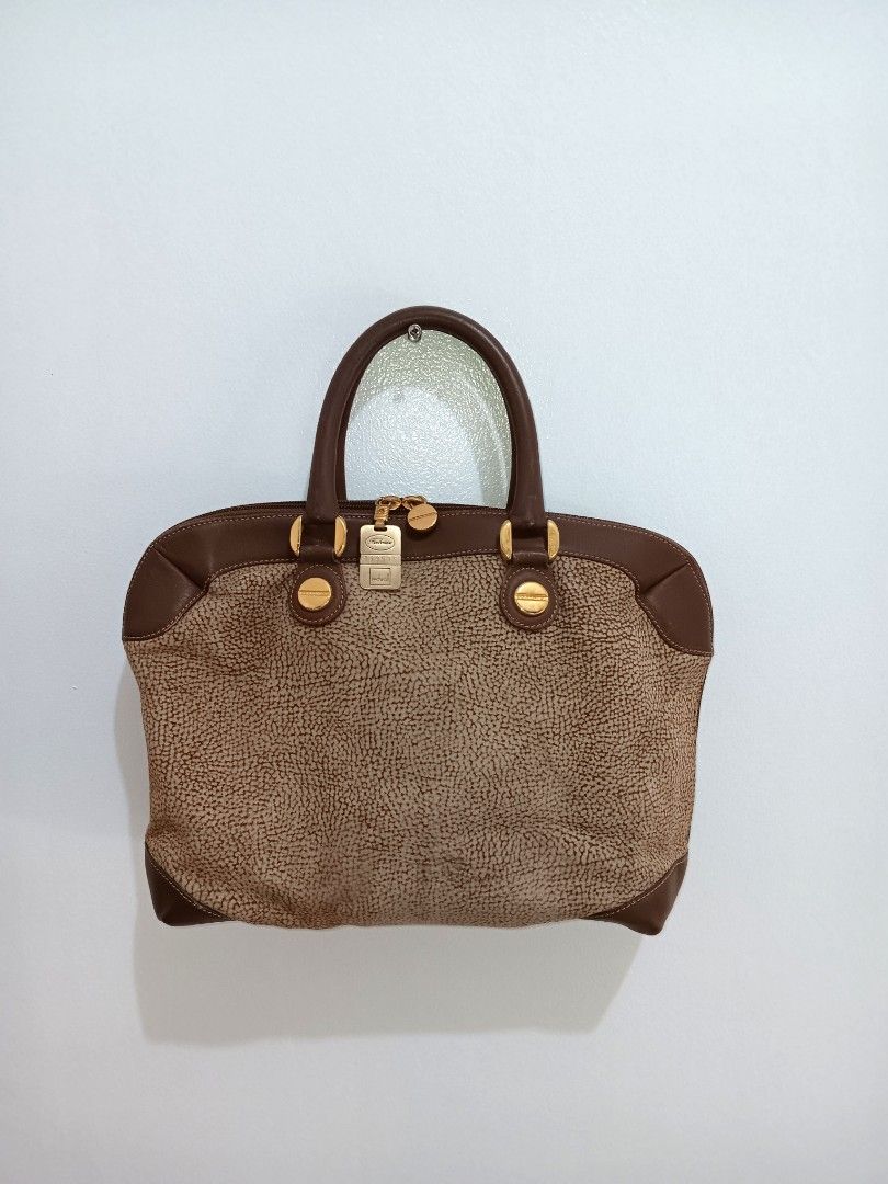 Borbonese hand bag (Category: Shoulder Bags) located in Pasig City. Submitted by theprelovedcartel (Listing ID 1247227423, Image 1). Description: Original Borbonese bag Made in Italy With signs of usage Manage your expectations Dimension: Length 12 inches Width 3.25 inches Height 9.5 inches Payment via GCash and Paymaya only No Meet-up, Cash on Delivery and Cash on Pick up No return, exchange and refund Same day delivery within Metro Manila via G