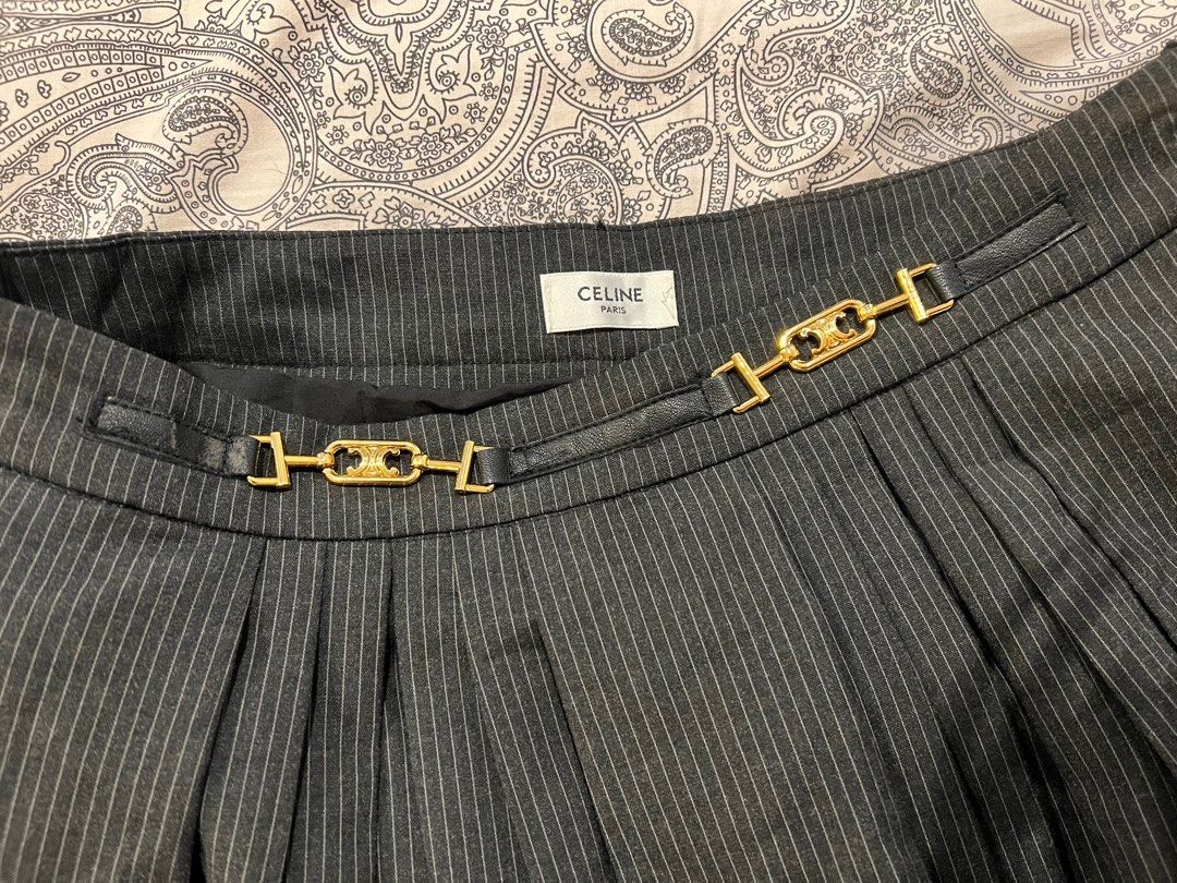 Celine skirt with inner short (Category: Skirts) located in Manila. Submitted by michllov (Listing ID 1247143141, Image 1). Description: Please see minor flow which is not noticeable Waist fits up to 28in waist Length 15in.