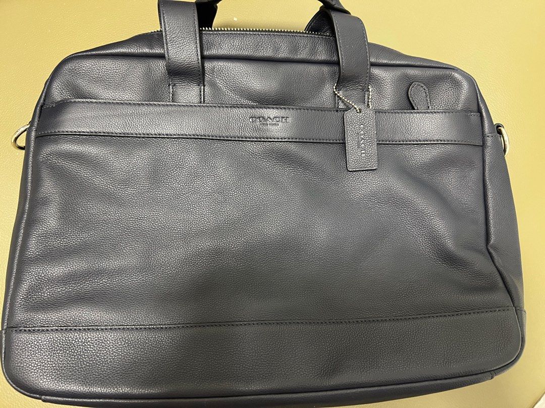 Coach best sale suit bag