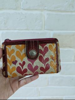 Fossil wallet with zip compartment