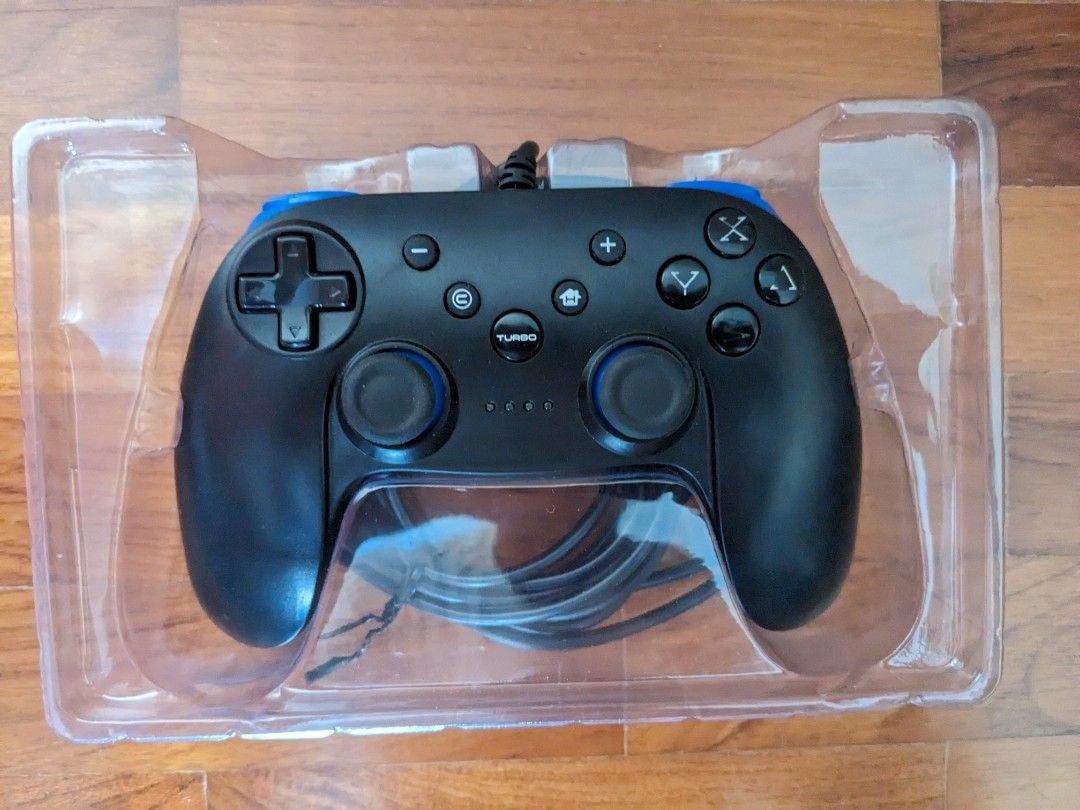 Game controller (wired) (Category: Others) located in Singapore. Submitted by rocket_punch (Listing ID 1247146305, Image 2). Description: item used slightly. box stated compatible with switch & PC. never tested on switch. controller does not work with some games on steam..