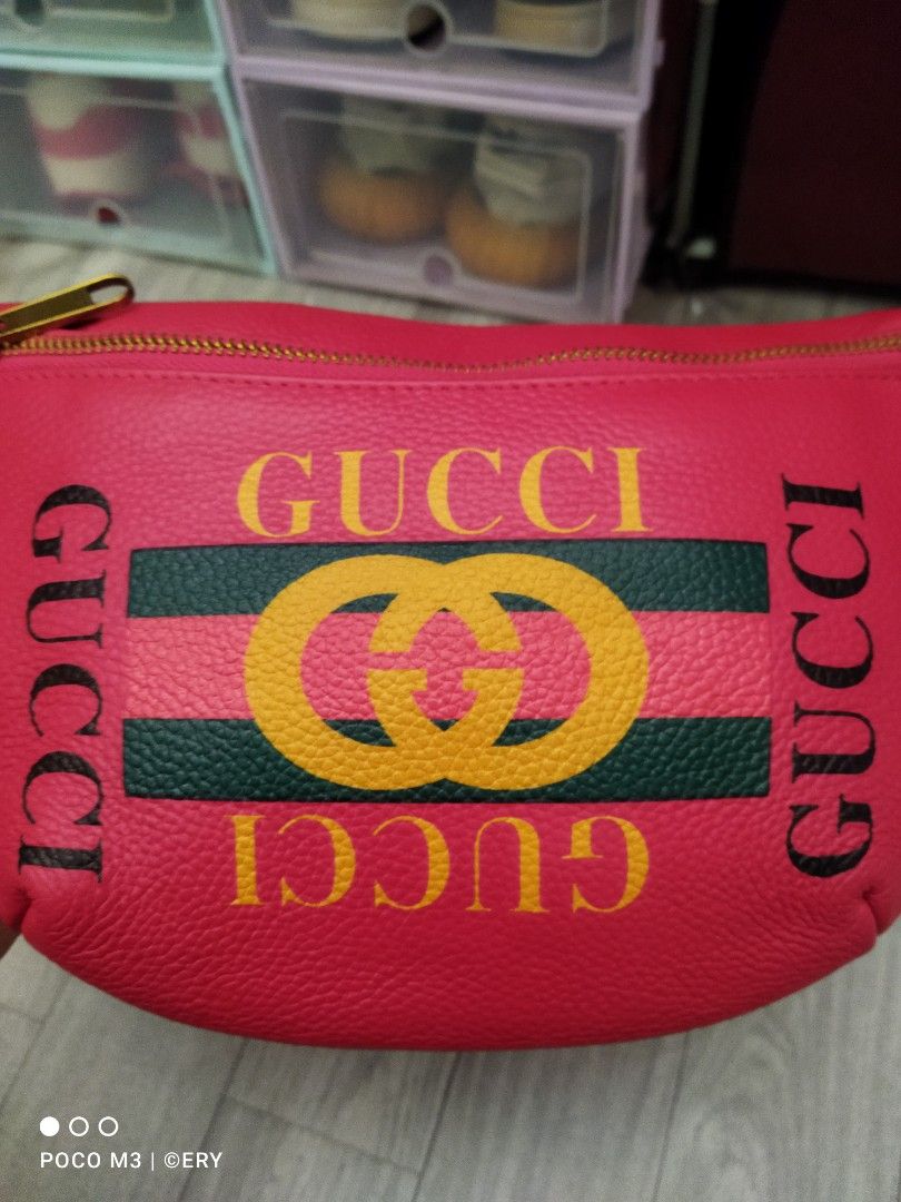 Gucci fanny pack with writing on it on sale