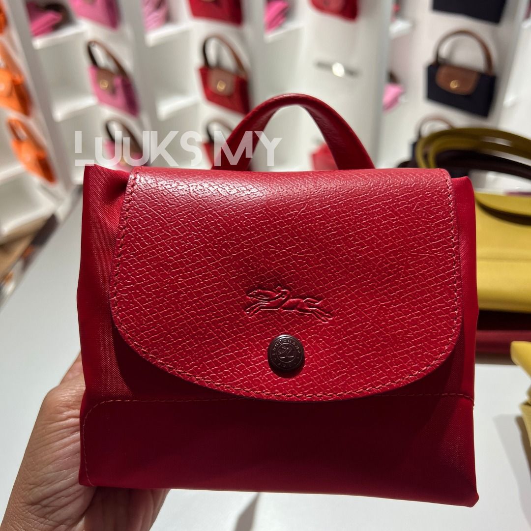 Longchamp Pouch with Handle Le Pliage, Luxury, Bags & Wallets on Carousell