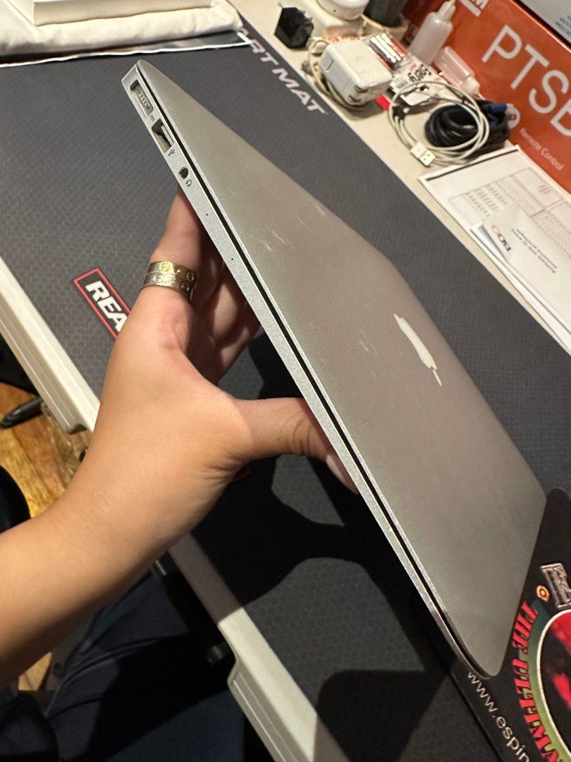 Macbook Air 13 inch 2015 / 128 GB (Category: Laptops & Notebooks) located in Pasig City. Submitted by soph__ (Listing ID 1247283771, Image 3). Description: - 1.6 GHz Dual Core Intel Core i5 - 128GB - MacOS Big Sur Has Flaws (Pics posted) - Black spots on camera but person can still visible on the screen. - scratches on the top part of the laptop - minor scratches along the sides - original charger is working & included * note : charger cord has y