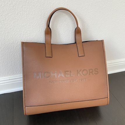 Michael Kors Cooper Logo Embossed Faux Pebbled Leather Tote Bag - ShopStyle