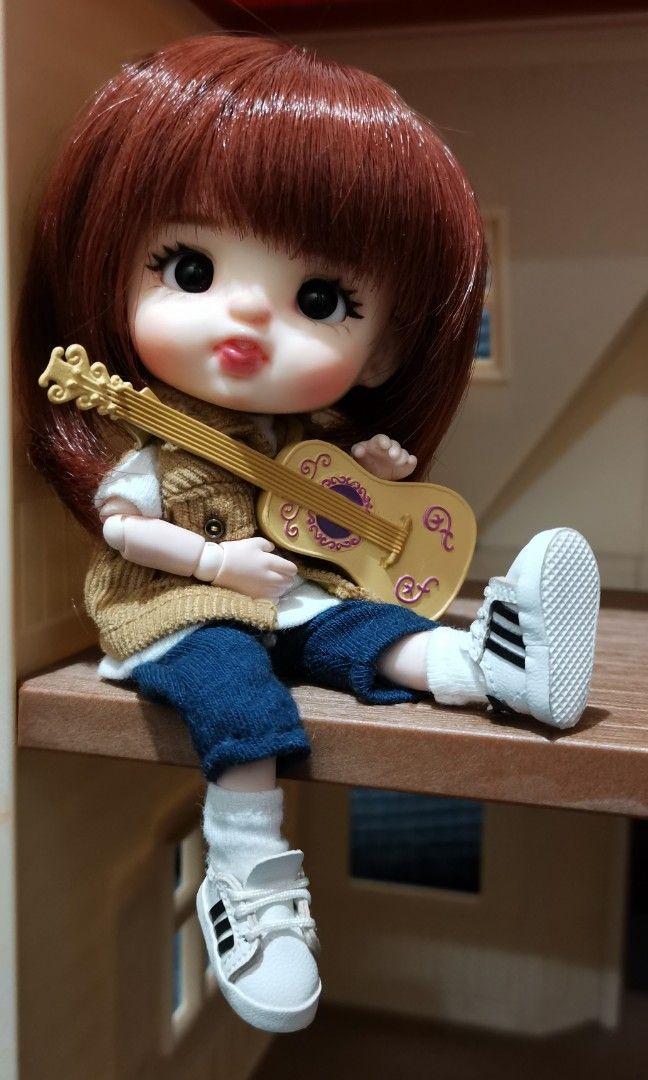 mini guitar (Category: Musical Instruments) located in Baguio. Submitted by ukay_district (Listing ID 1247258116, Image 3). Description: miniature guitar *doll not for sale 150 last price.