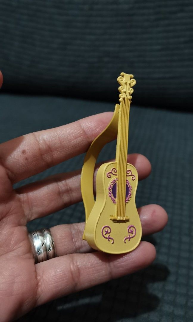 mini guitar (Category: Musical Instruments) located in Baguio. Submitted by ukay_district (Listing ID 1247258116, Image 1). Description: miniature guitar *doll not for sale 150 last price.