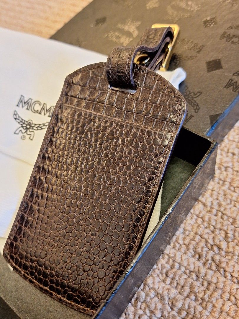 Mcm luggage on sale tag