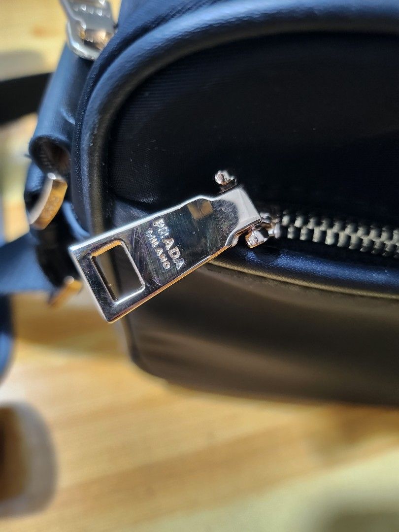 Prada camera bag (Category: Luxury Bags & Wallets) located in Manila. Submitted by shoppingspree008 (Listing ID 1247189610, Image 2). Description: NGA. last price. super nice and spacious.