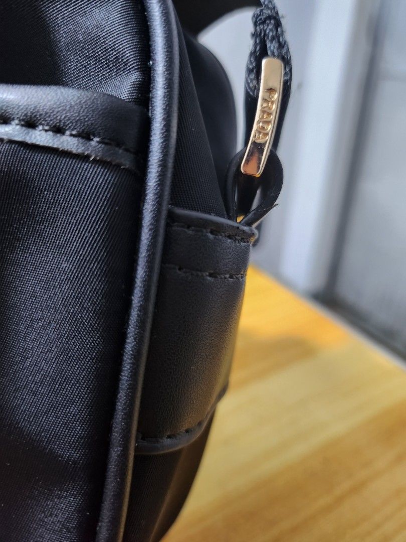Prada camera bag (Category: Luxury Bags & Wallets) located in Manila. Submitted by shoppingspree008 (Listing ID 1247189610, Image 3). Description: NGA. last price. super nice and spacious.