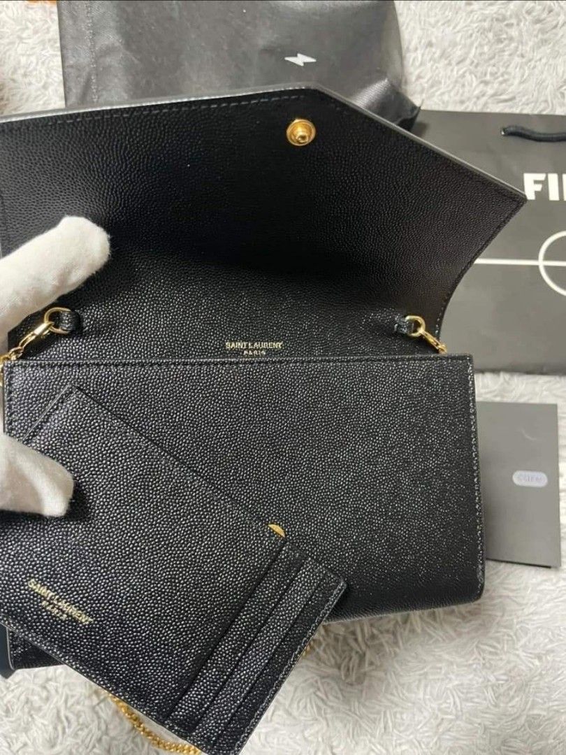 Pre order (Category: Luxury Bags & Wallets) located in Cabadbaran. Submitted by luxurysourcedbyjinx (Listing ID 1247256889, Image 2). Description: YSL Uptown WOC ✨ 9/10 condition With dust bag, box, booklet, and guarantee card❤️.