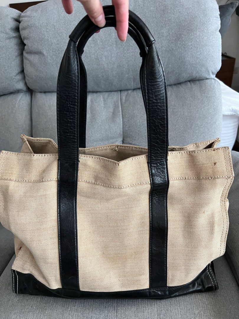 Tory Burch Canvas Tote in Beige & Black (Category: Luxury Bags & Wallets) located in Makati City. Submitted by macypants (Listing ID 1247182555, Image 3). Description: Authentic Tory Burch Canvas Tote in Beige and Black No inclusions W cracking of edges on top portion of the bag, small stains on the side Will send more photos upon request .