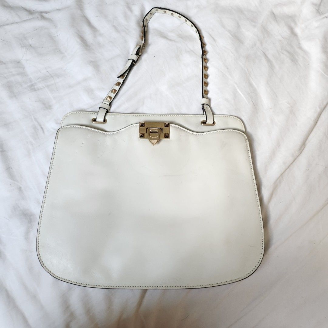 Valentino Garavani pouch, Luxury, Bags & Wallets on Carousell