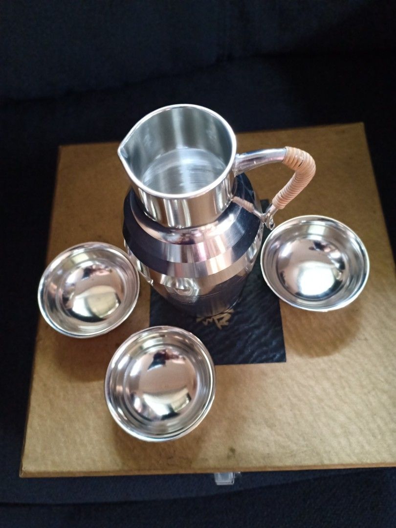 Vintage Tin Sake set (Category: Coffee & Tea Tableware) located in Binangonan. Submitted by stufflikedat (Listing ID 1247208673, Image 3). Description: Vintage Hontin Sake set 4-piece set Chirori & Inoguchi Tokkuri Sake Tin Cup [Size] Chirori height approx. 11 cm, width 5 cm, Inoguchi height approx. 2 cm, 1 cm diameter, new never been used with original box for 800 Add for shipping.