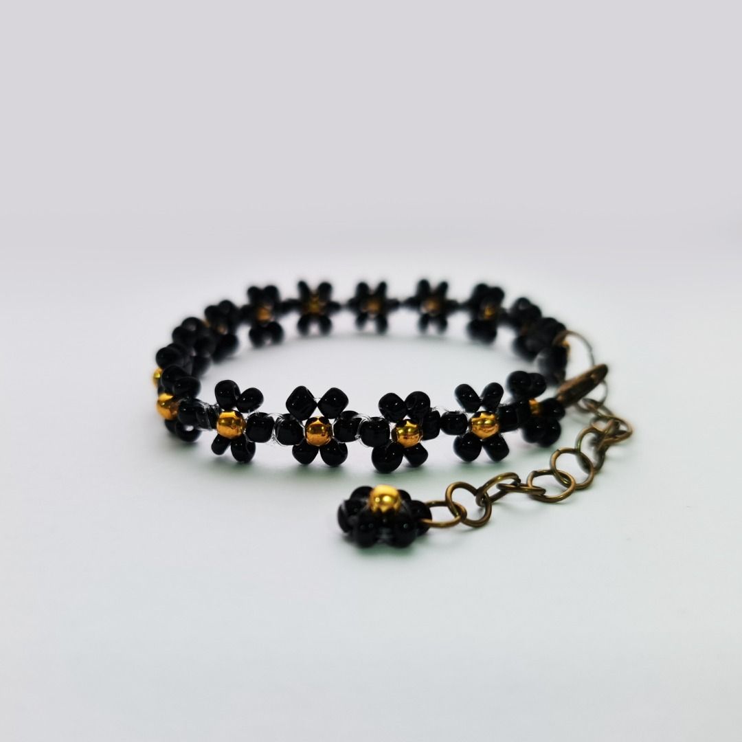 Gold black bracelets outlet for ladies