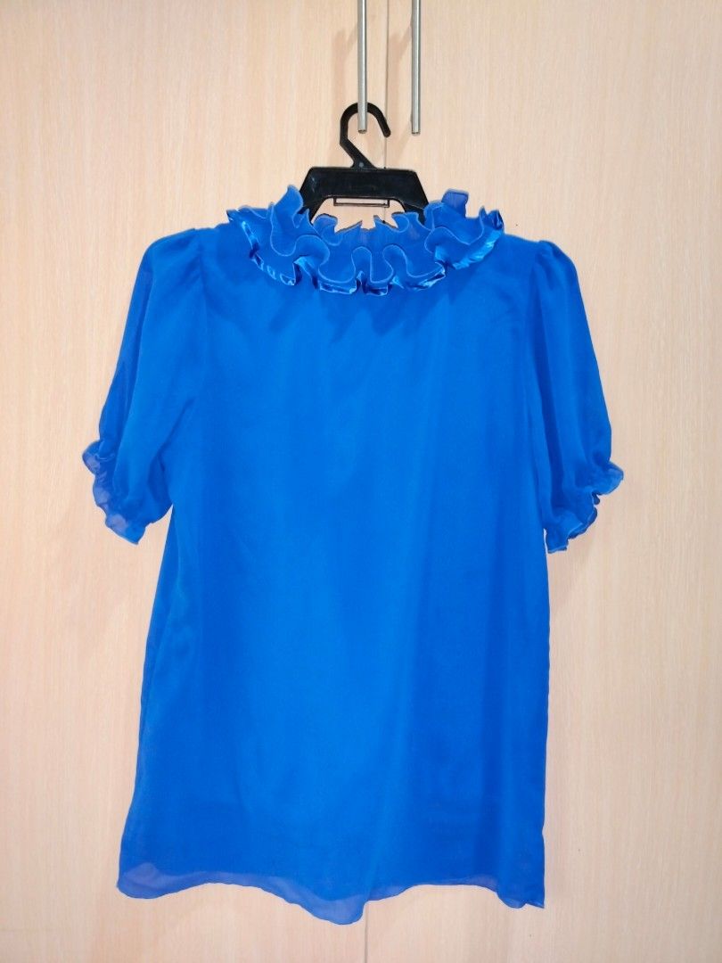 Blue ruffles sleeves blouse (preloved, Xara by Georgetown) (Category: Blouses) located in Quezon City. Submitted by SanchoSol (Listing ID 1246834381, Image 2). Description: • Pre loved Xara by Georgetown blouse • Color: blue • RFS: Decluttering • See PICTURES for exact measurement/ description. • STRICTLY NO CANCELLATION OF ORDERS. • Product cannot be returned/refunded unless a wrong item was delivered. #buhayzerowaste #xara #georgetown #blouse #