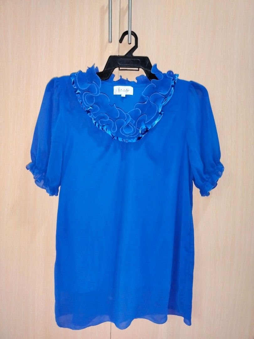 Blue ruffles sleeves blouse (preloved, Xara by Georgetown) (Category: Blouses) located in Quezon City. Submitted by SanchoSol (Listing ID 1246834381, Image 1). Description: • Pre loved Xara by Georgetown blouse • Color: blue • RFS: Decluttering • See PICTURES for exact measurement/ description. • STRICTLY NO CANCELLATION OF ORDERS. • Product cannot be returned/refunded unless a wrong item was delivered. #buhayzerowaste #xara #georgetown #blouse #