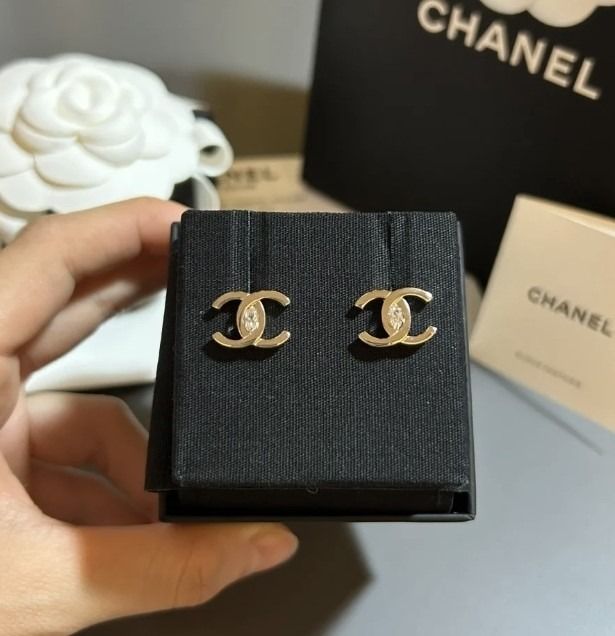 Gold chanel earrings cc sale