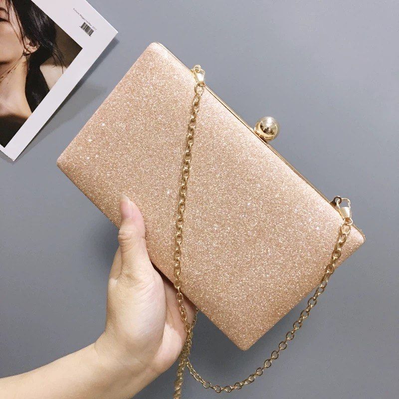 Champagne glitter hotsell clutch bag