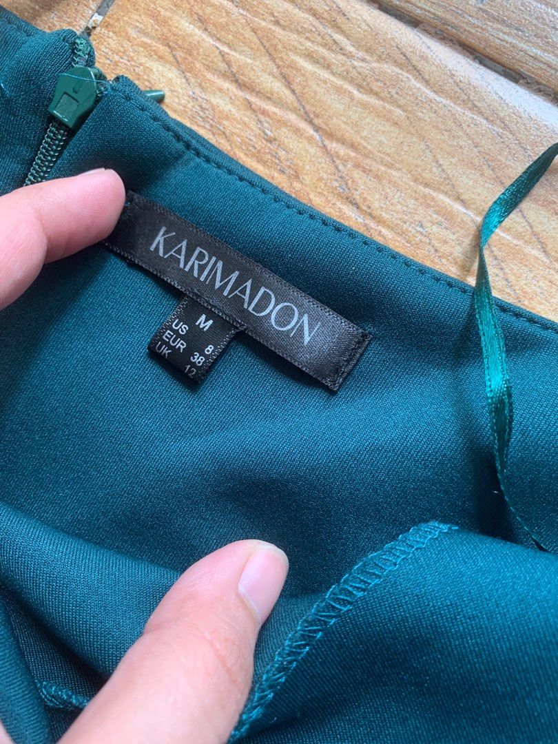Karimadon semi formal dress (Category: Evening dresses & gowns) located in Rizal. Submitted by korskloset (Listing ID 1247346168, Image 2). Description: Original Karimadon dress Bought for 2k+ at the mall. Used only once, minimal flaws (see last photo) Below the knee length for 5’0-5’1” in height. Emerald green color in person, fits very comfortably. Message me for when worn photos..