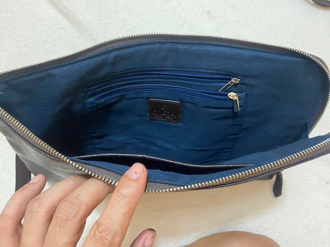 Okachi Japan Thick Leather Pouch Document Holder (Category: Luxury Bags & Wallets) located in Bacolod City. Submitted by lux-influx (Listing ID 1247358603, Image 2). Description: Up for sale, swap, trade or barter is an Okachi pouch or document holder, made of thick leather, measures 14" width x 9" high, can fit a small laptop or tablet, with pockets inside. Made in Japan. Buyer pays for shipping. Please check other items on sale or swap. Thanks!