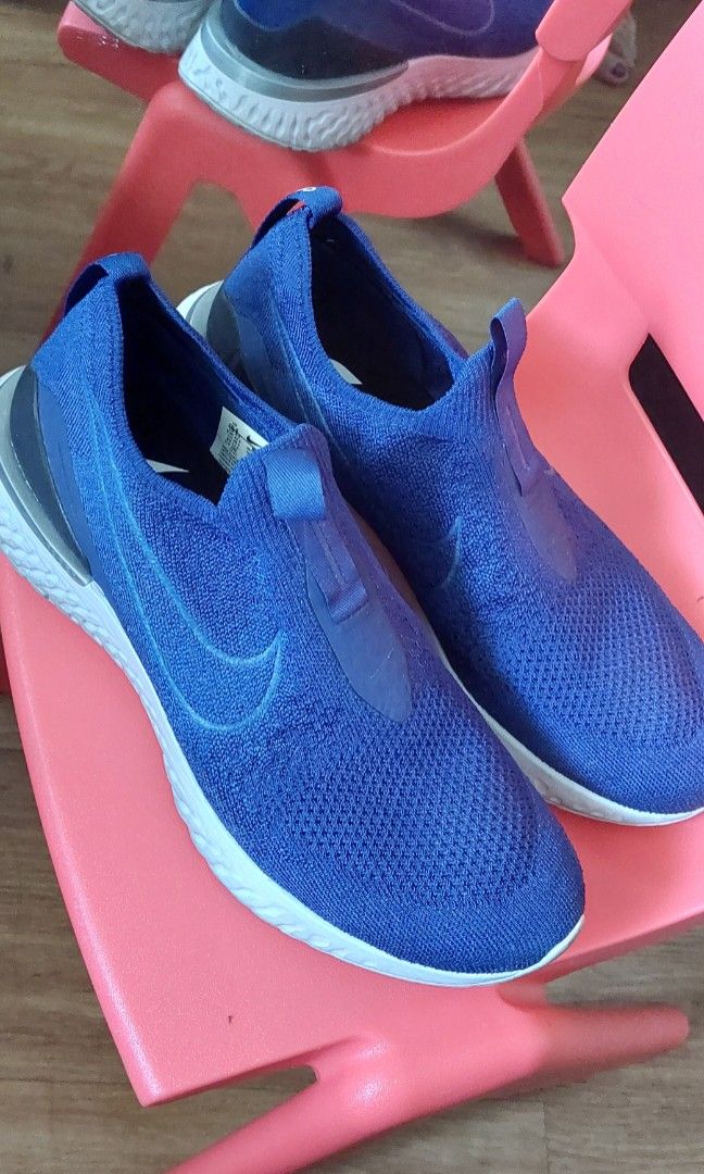 Pre-loved Nike Epic Phantom React (Category: Sneakers) located in Pasig City. Submitted by joyc04497 (Listing ID 1247316116, Image 1). Description: Pre-loved but no flaws Bought in 2021 Size 10.5 (US).