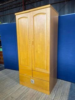 Wardrobe 34”L x 22”W x 71”H  2 doors 3 pullout drawers In good condition