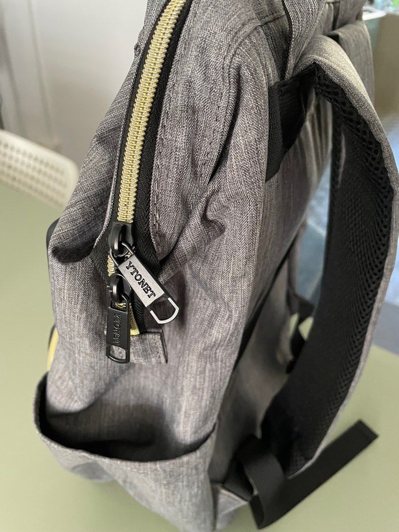 Backpack YTONET (Category: Backpacks) located in Singapore. Submitted by jolaure (Listing ID 1247532199, Image 3). Description: Brand new backpack with charging port (see pics) Clearing house for move.