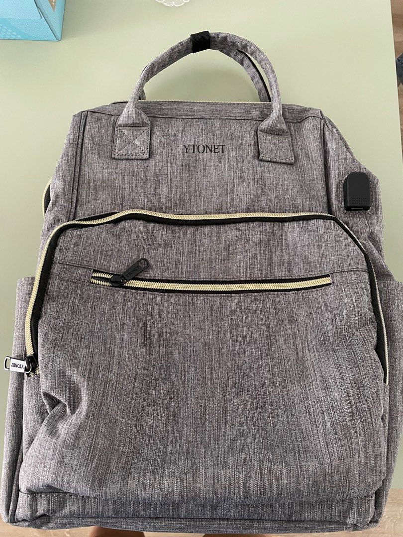 Backpack YTONET (Category: Backpacks) located in Singapore. Submitted by jolaure (Listing ID 1247532199, Image 1). Description: Brand new backpack with charging port (see pics) Clearing house for move.