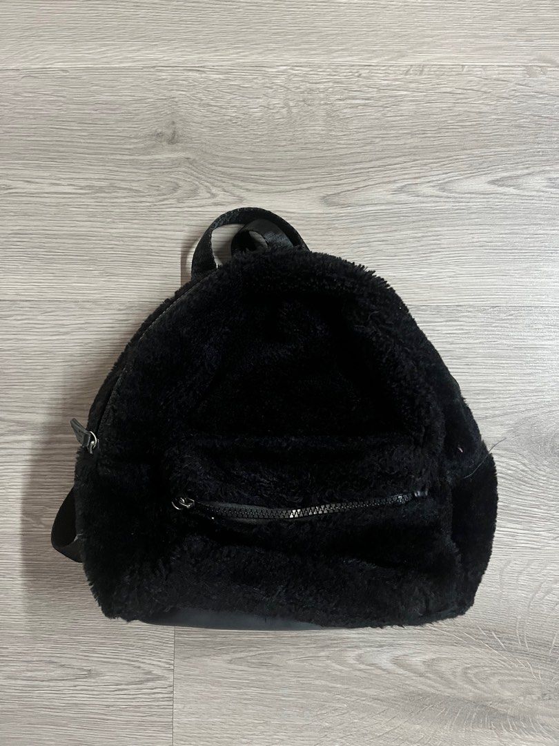 Black furry hotsell backpack