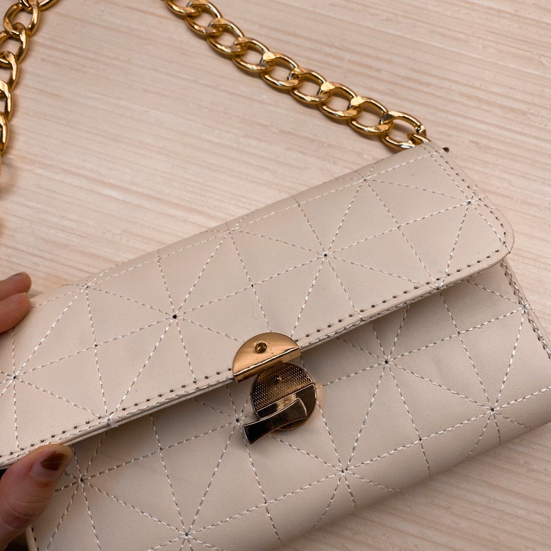 Cream gold clutch on sale bag