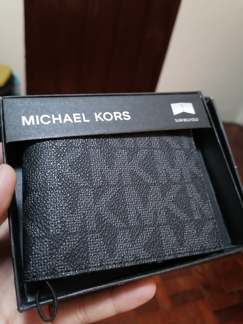 Michael Kors slim wallet on Carousell